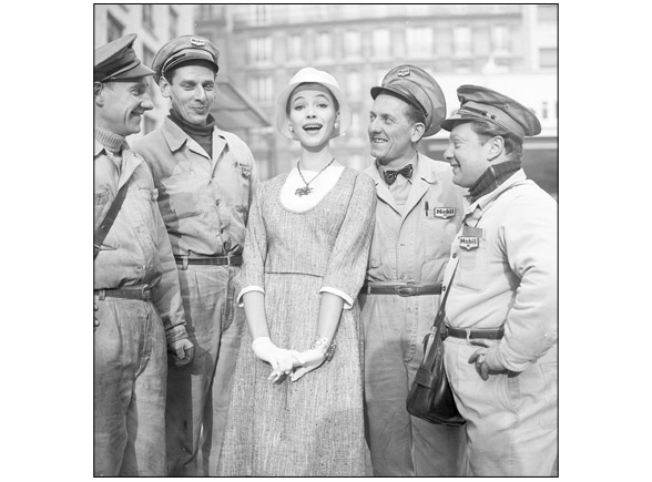 Anna Karina and gas pump attendants